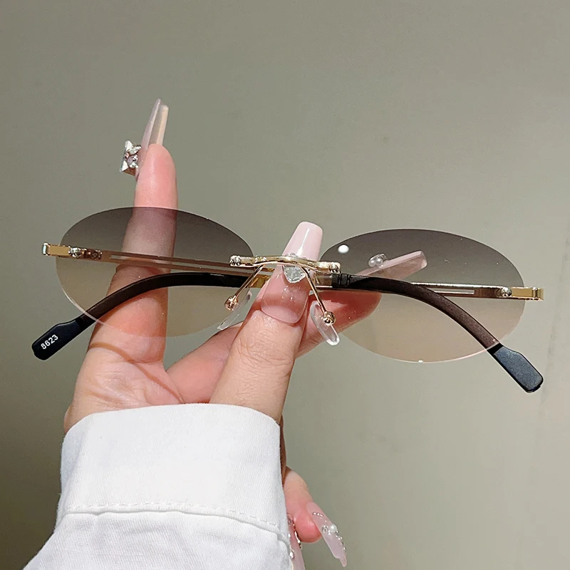 Rimless Oval Sunglasses Women  - огляд і ціна Designer Sunglasses